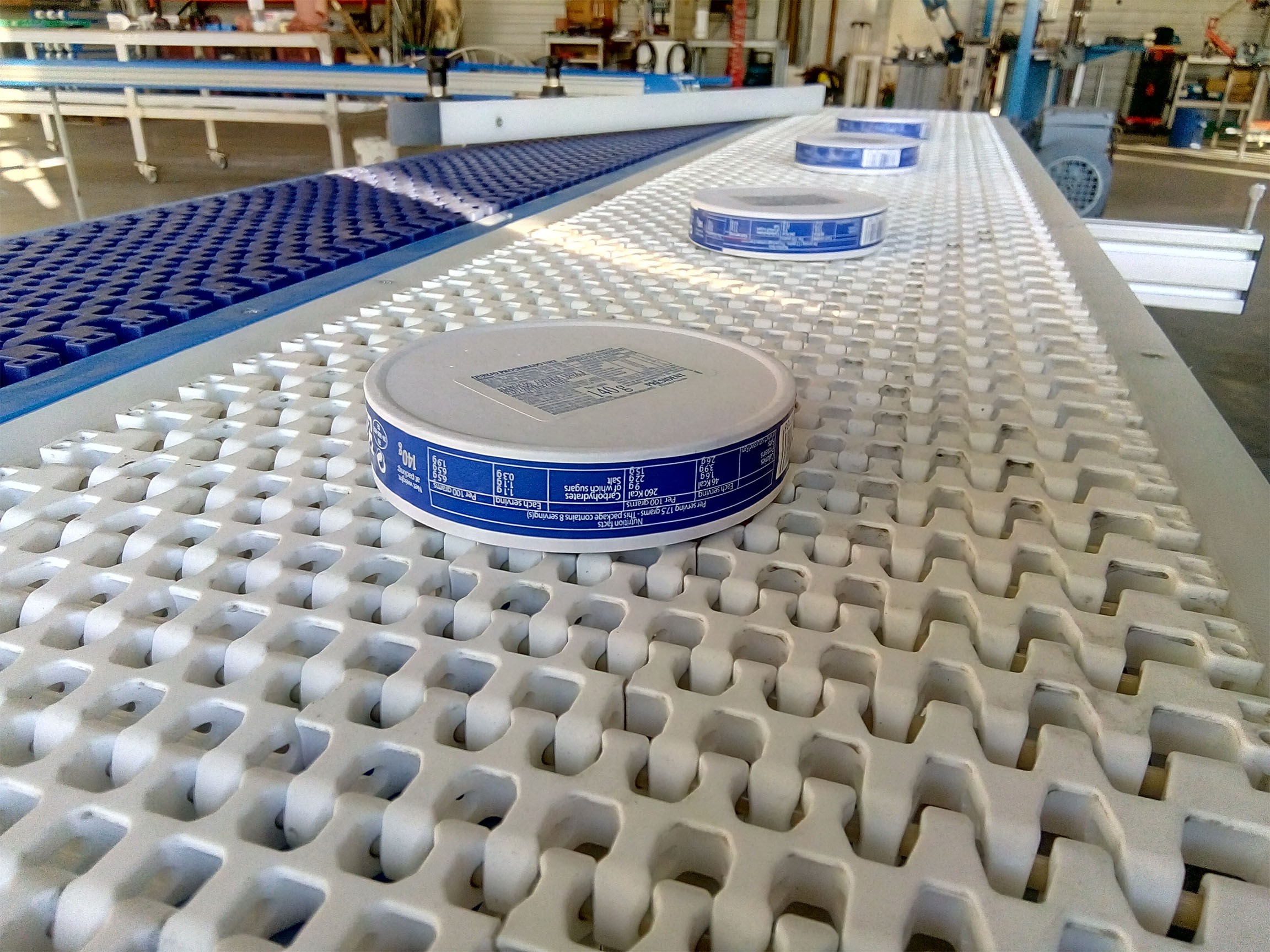 MG Tech product conveying - Product transfer and realignment