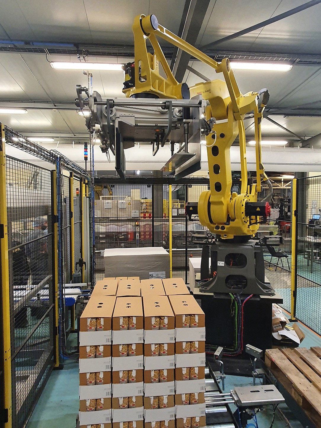 PALETIZADOR MG TECH PARA LA INDUSTRIA DE PRODUCTOS DULCES